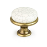 Krásný rustikální porcelánový knoflík o výšce 26 mm. Průměr horní části je 28 mm.