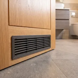 Oboustranná ventilační mřížka do dveří 430 x 115 mm / Grafit
