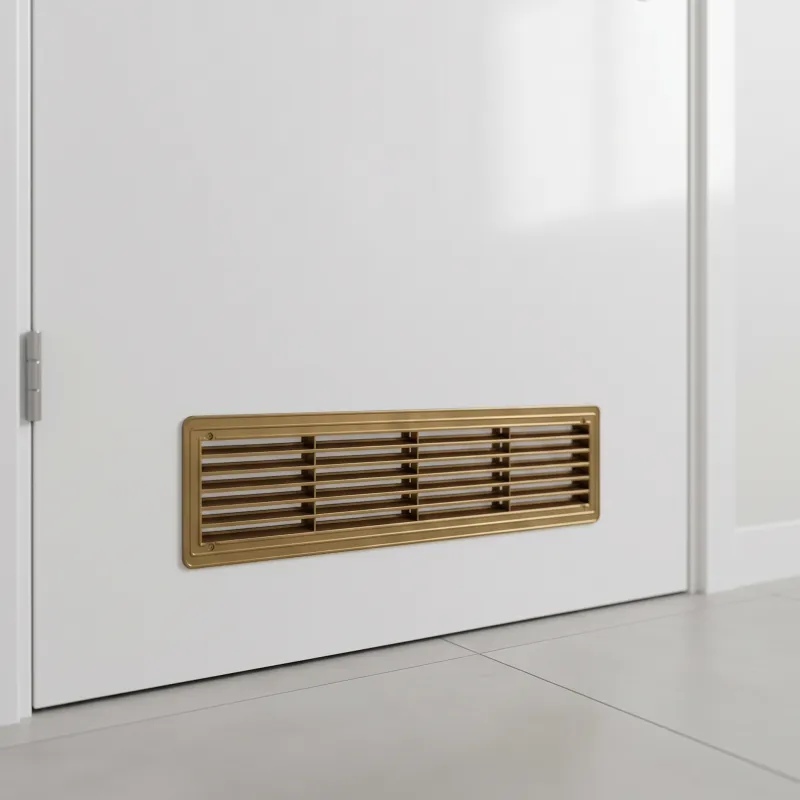Oboustranná ventilační mřížka do dveří 430 x 115 mm / Zlatá patina